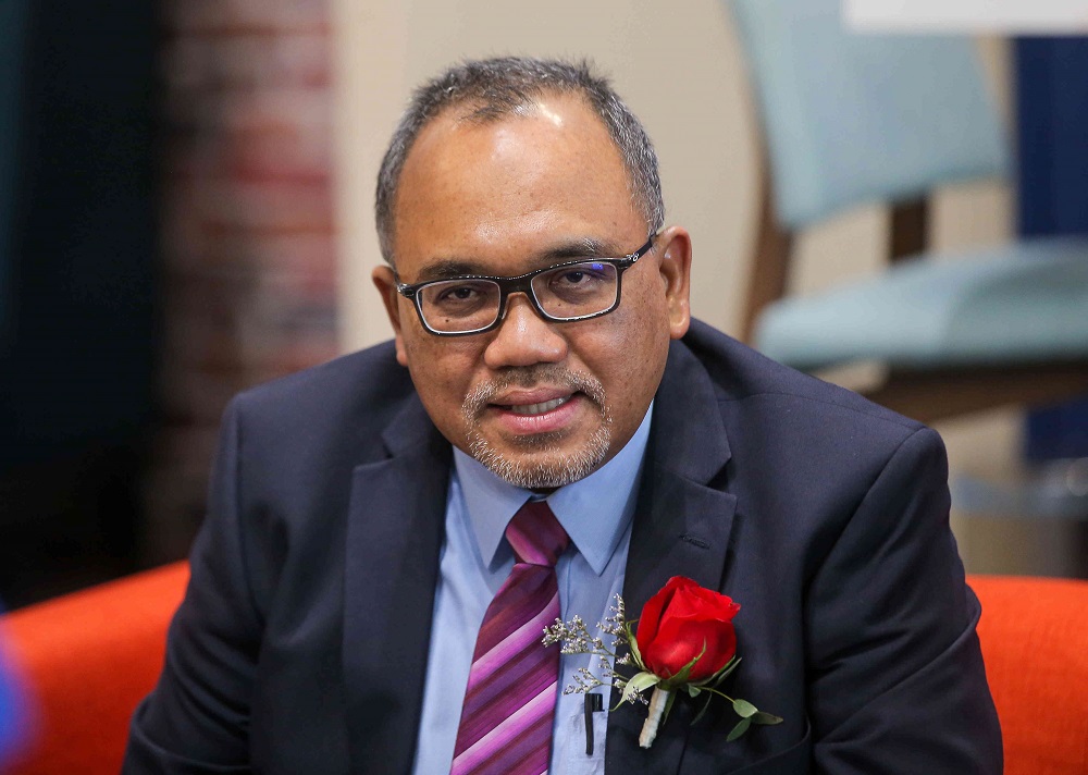 Perak Speaker Datuk Mohamad Zahir Abdul Khalid speaks to the press during the International Womenu00e2u20acu2122s Day Seminar 2021 at the Ipoh International Convention Centre March 8, 2021 u00e2u20acu201d Picture by Farhan Najib