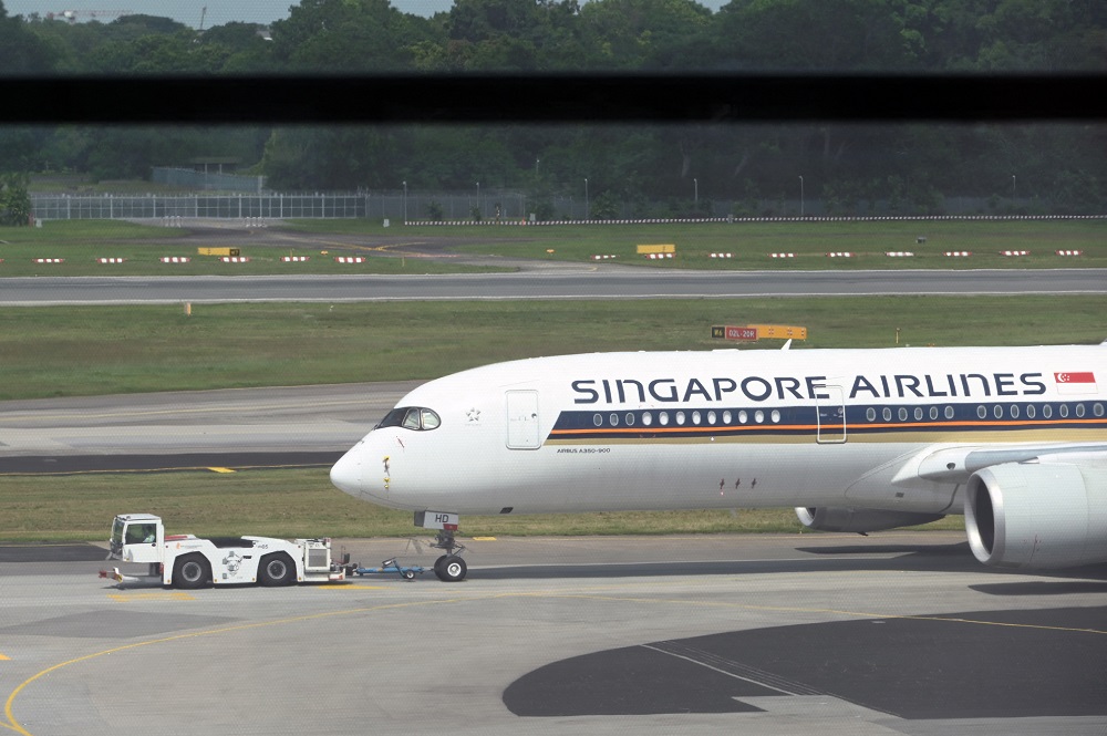 Singapore Airlines will begin trialling a coronavirus digital travel pass developed by aviationu00e2u20acu2122s industry body next week. u00e2u20acu201d AFP pic