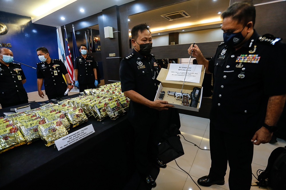 Penang police chief Datuk Sahabudin Abd Manan (right) during a press conference in George Town February 22, 2021.