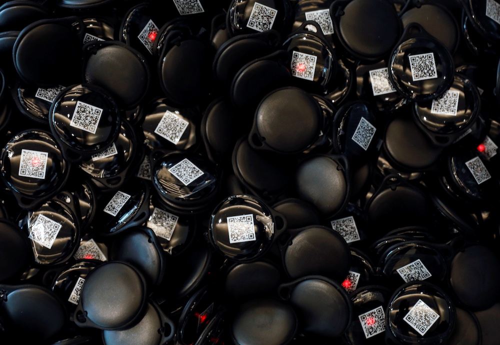 Movement-tracking u00e2u20acu02dcSafeletu00e2u20acu2122 devices that are issued to attendees, as part of the coronavirus disease (Covid-19) safety precautions, are pictured at the Geo Connect Asia conference in Singapore March 24, 2021. u00e2u20acu201d Reuters pic 