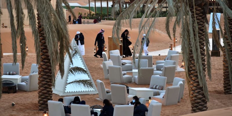 Visitors relax in a lounge area beneath palm trees at the Riyadh Oasis, a luxury retreat in the Thumamah desert on the outskirts of the Saudi capital. u00e2u20acu201d AFP pic