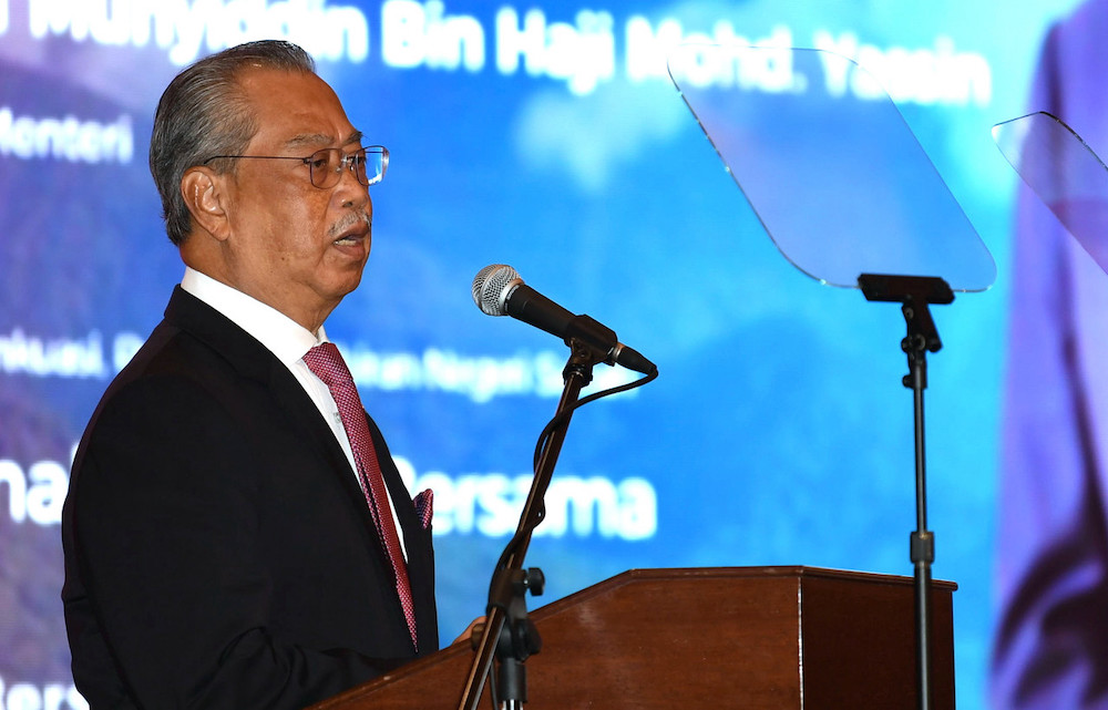 Prime Minister Tan Sri Muhyiddin Yassin delivering his speech during the 'Prosper Together With Sabah 2030' townhall session at the Sabah State Administrative Centre in Kota Kinabalu, March 22, 2021. u00e2u20acu201d Bernama pic