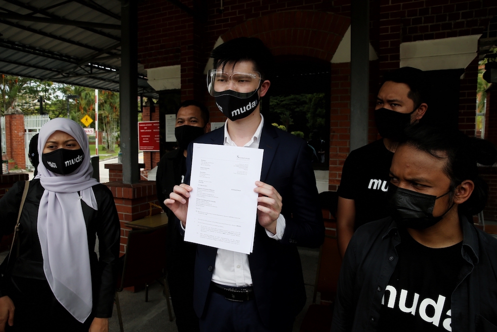 MUDA vice president and lawyer, Lim Wei Jiet, along with other members of the party are seen in Putrajaya, March 25, 2021. u00e2u20acu201d Picture by Choo Choy May