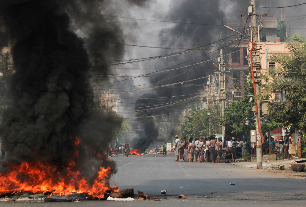 Tyres burn on a street as protests against the military coup continue, in Mandalay, Myanmar March 27, 2021. u00e2u20acu201d Reuters pic
