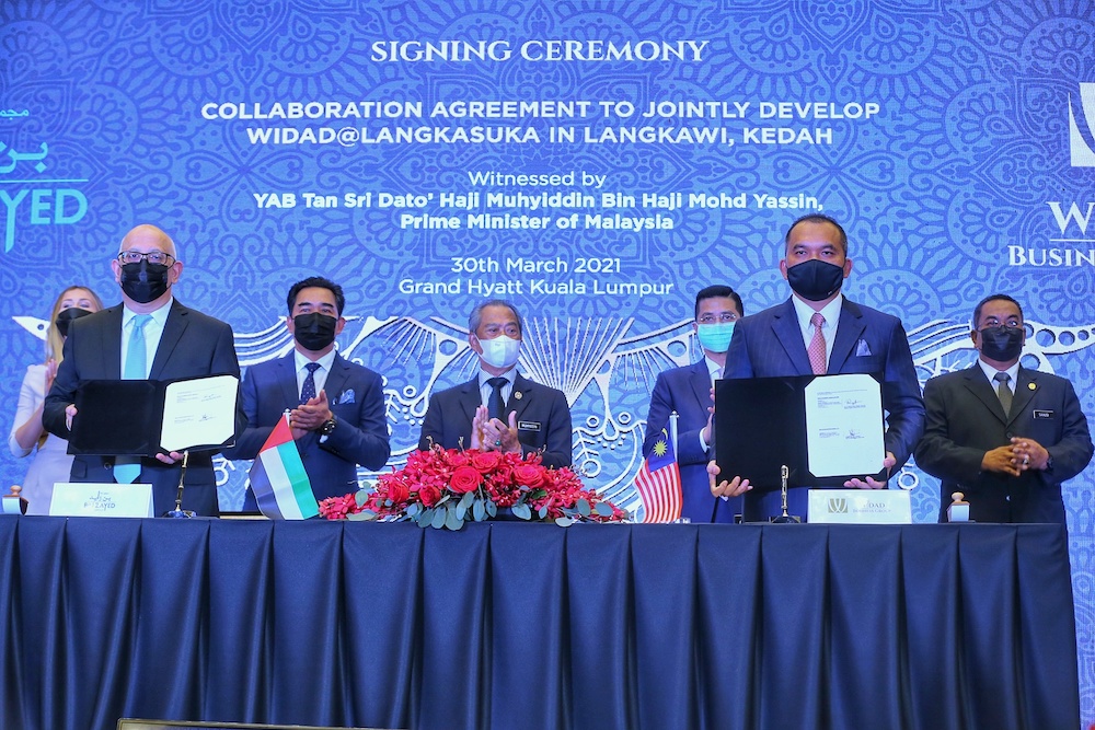 Prime Minister Tan Sri Muhyiddin Yassin attends the Collaboration Agreement signing ceremony between Bin Zayed Group and Widad Business Group in Kuala Lumpur March 30, 2021. u00e2u20acu201d Picture by Ahmad Zamzahuri