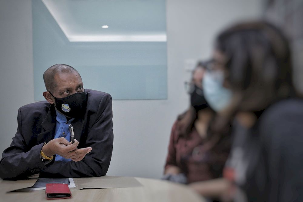 Representing the 20-year-old victim, lawyer K. Ganesh speaks to the press over the concerns and circumstances of his client at his law firm, March 16, 2021. u00e2u20acu201d Picture by Ahmad Zamzahuri