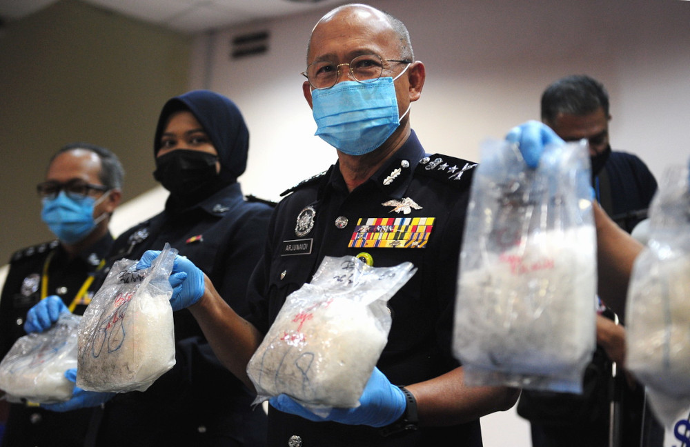 Acting Selangor police chief Datuk Arjunaidi Mohamed with the seized drugs at the Selangor Police headquarters in Shah Alam, March 3, 2021. u00e2u20acu201d Bernama pic 