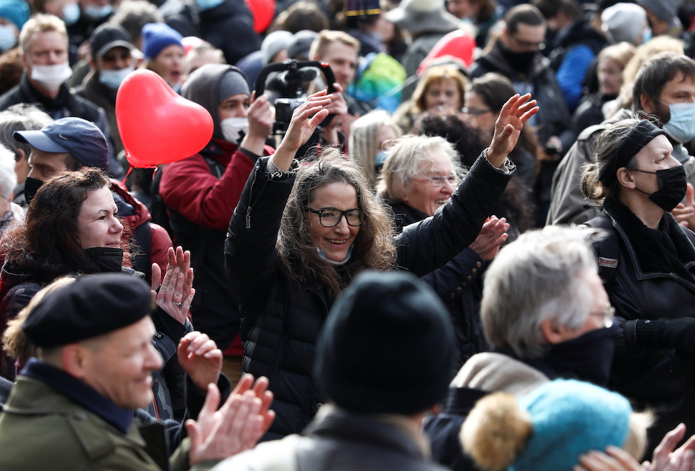Protesters attend a rally against the government's restrictions following the coronavirus disease outbreak in Berlin, Germany, March 13, 2021. u00e2u20acu201d Reuters picnn