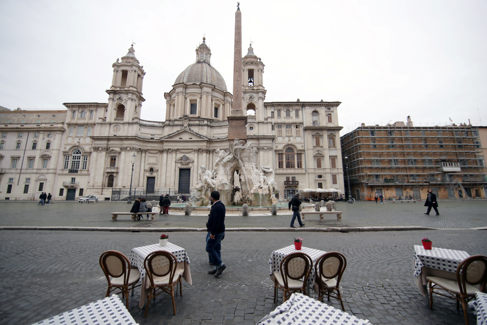 Empty tables are pictured in Piazza Navona as the government is due to announce stricter coronavirus disease restrictions, in Rome, Italy, March 12, 2021. u00e2u20acu201d Reuters picnn