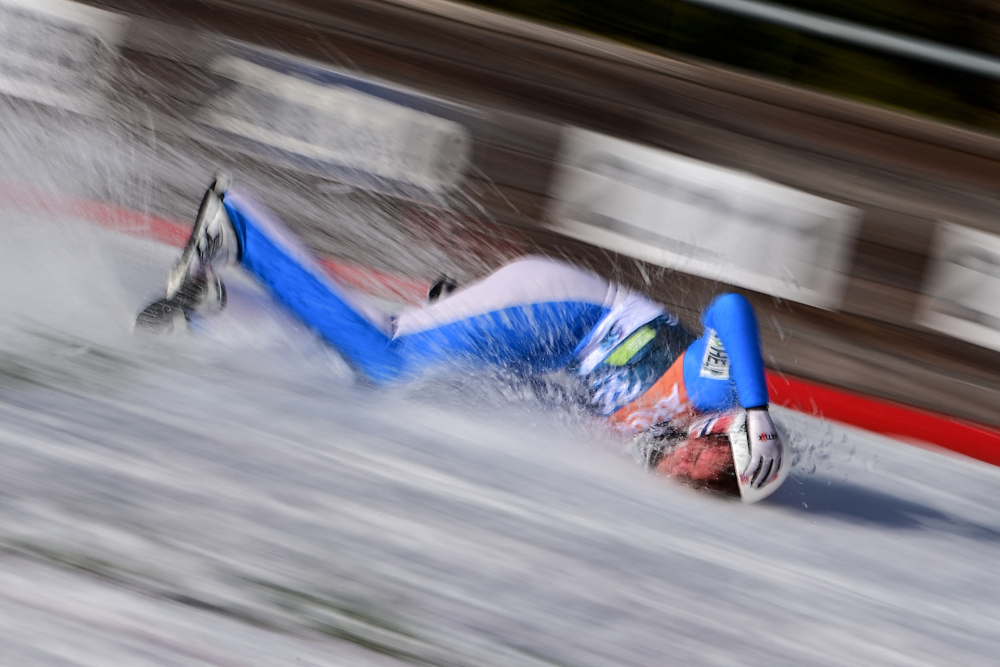 Norwayu00e2u20acu2122s Daniel Andre Tande falls to the ground during the FIS Ski Jumping World Cup Flying Hill Individual competition in Planica March 25, 2021. u00e2u20acu201d AFP picnn