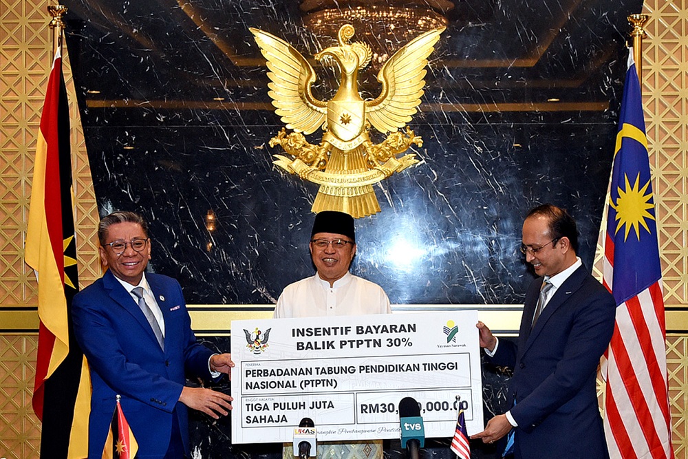 Sarawak Chief Minister Datuk Patinggi Abang Johari Openg (centre) during the Mou exchange between Yayasan Sarawak and PTPTN at his office in Petra Jaya March 5, 2021. u00e2u20acu201d Bernama pic