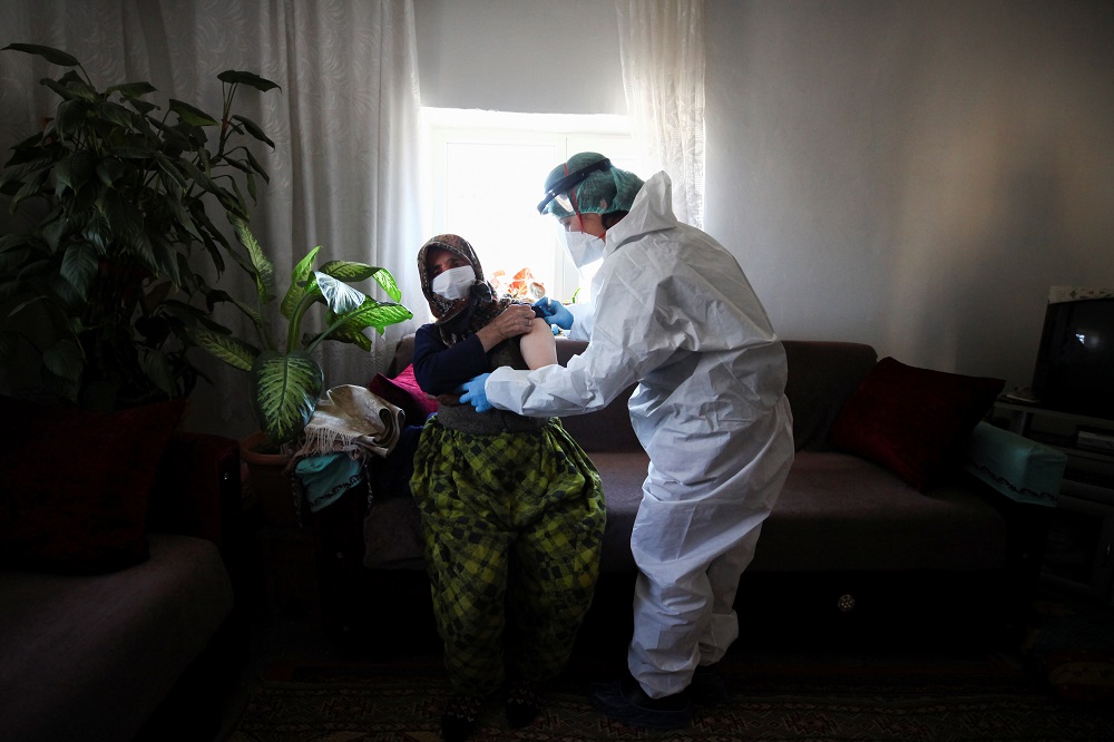 A woman living in Deliler village near Elmadag receives the second dose of Sinovac's CoronaVac Covid-19 vaccine at her home in Ankara, Turkey March 3, 2021. u00e2u20acu2022 Reuters pic