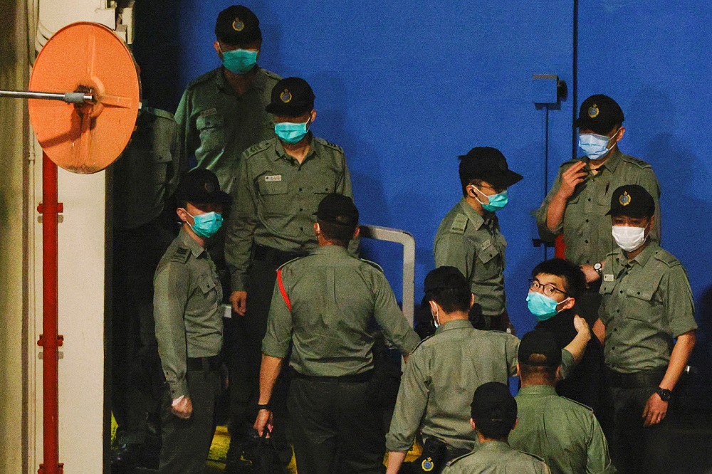 Pro-democracy activist Joshua Wong looks on upon arriving at Lai Chi Kok Reception Centre after he remained in custody over the national security law charge, in the early morning, in Hong Kong March 2, 2021. u00e2u20acu2022 Reuters pic