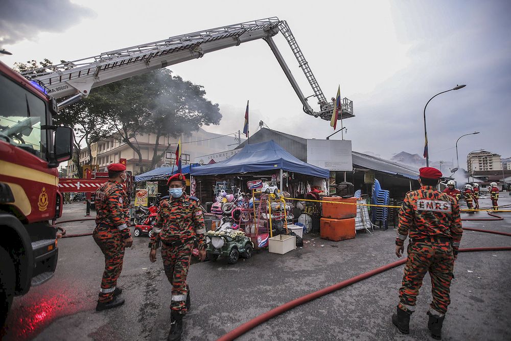 Fire destroyed more than 40 stalls at the Dato Keramat wet market along Jalan Keramat Dalam in Kuala Lumpur, March 17, 2021. u00e2u20acu201d Picture by Hari Anggara