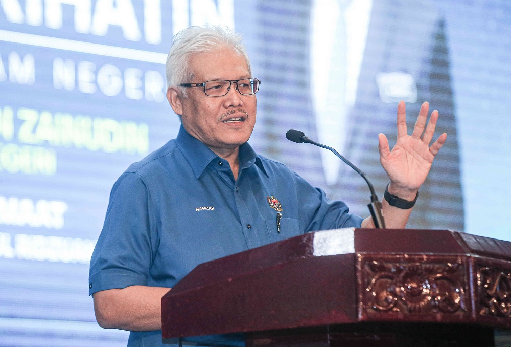 Home Minister Datuk Seri Hamzah Zainudin delivers his speech at the ministryu00e2u20acu2122s Malaysia Prihatin programme at the State Secretariat Building in Ipoh March 19, 2021. u00e2u20acu2022 Picture by Farhan Najib