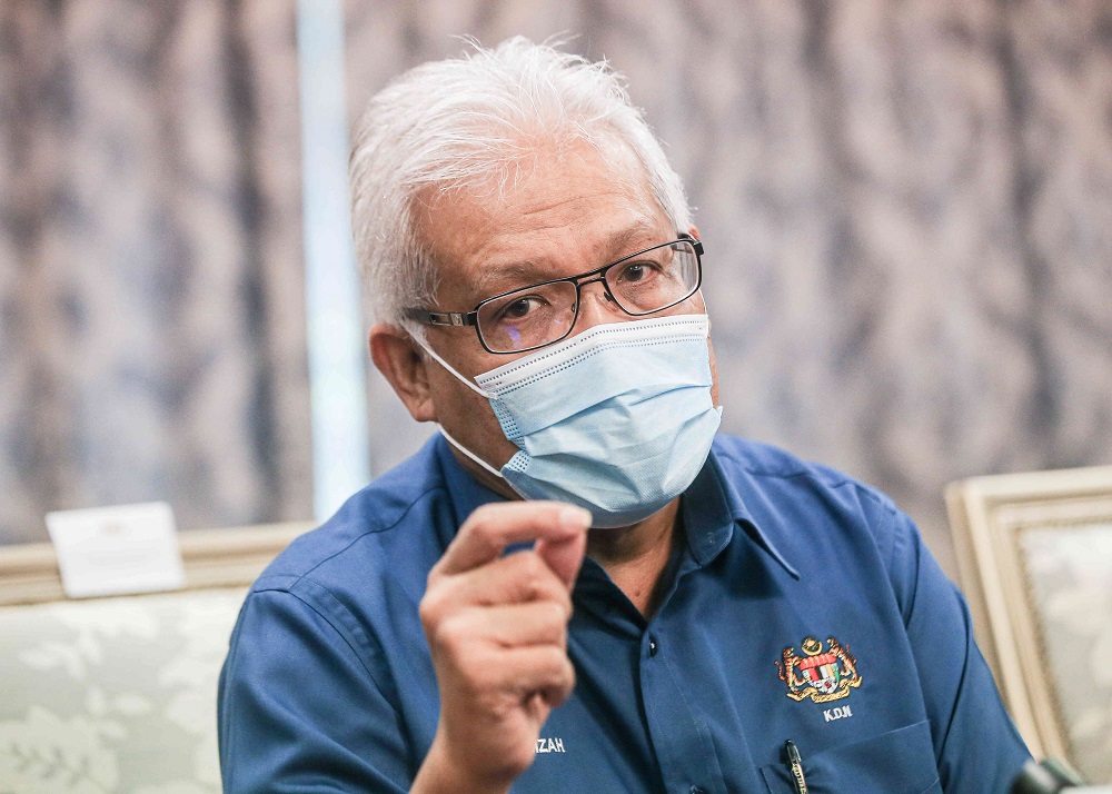 Home Minister Datuk Seri Hamzah Zainudin delivers his speech at the ministryu00e2u20acu2122s Malaysia Prihatin programme at the State Secretariat Building in Ipoh March 19, 2021. u00e2u20acu2022 Picture by Farhan Najibn