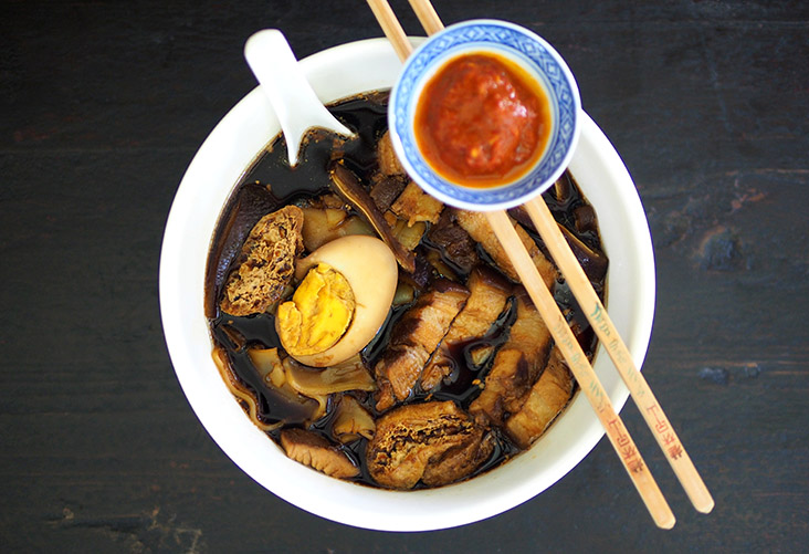 Slurp down a fragrant bowl of 'kuey chap' packed with tender pork belly slices and various innards.