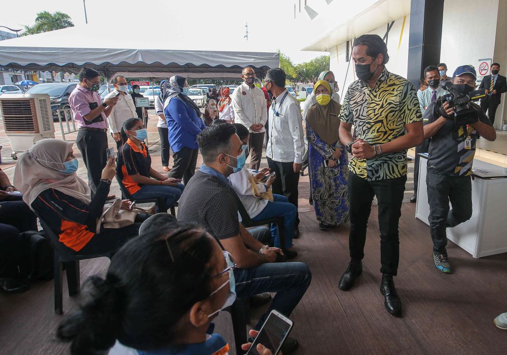 Minister of Science, Technology and Innovation Khairy Jamaluddin during a visit to the vaccination centre at the Indera Mulia Stadium in Ipoh March 16, 2021. u00e2u20acu201d Picture by Farhan Najib