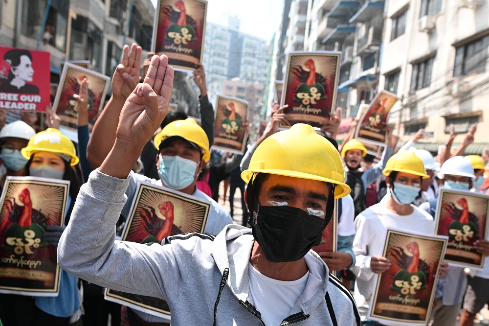 Demonstrators flash the three-finger salute during a protest against the military coup in Yangon March 1, 2021. u00e2u20acu2022 Reuters pic