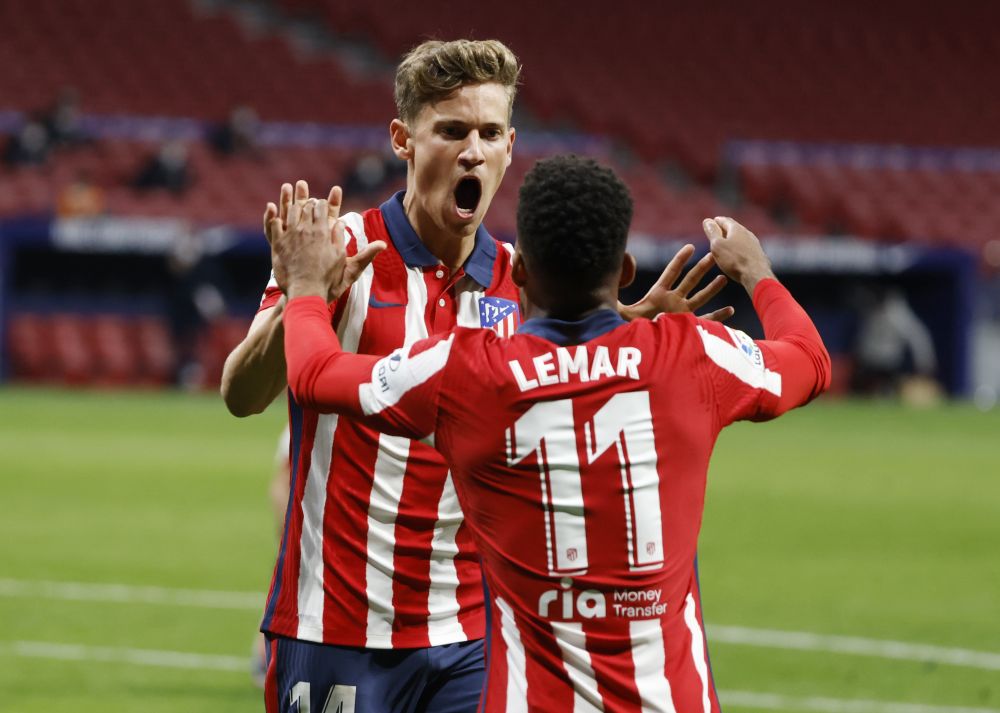 Atletico Madrid's Marcos Llorente celebrates scoring their first goal against Athletic Bilbao with Thomas Lemar at the Wanda Metropolitano, Madrid March 10, 2021. u00e2u20acu201d Reuters pic