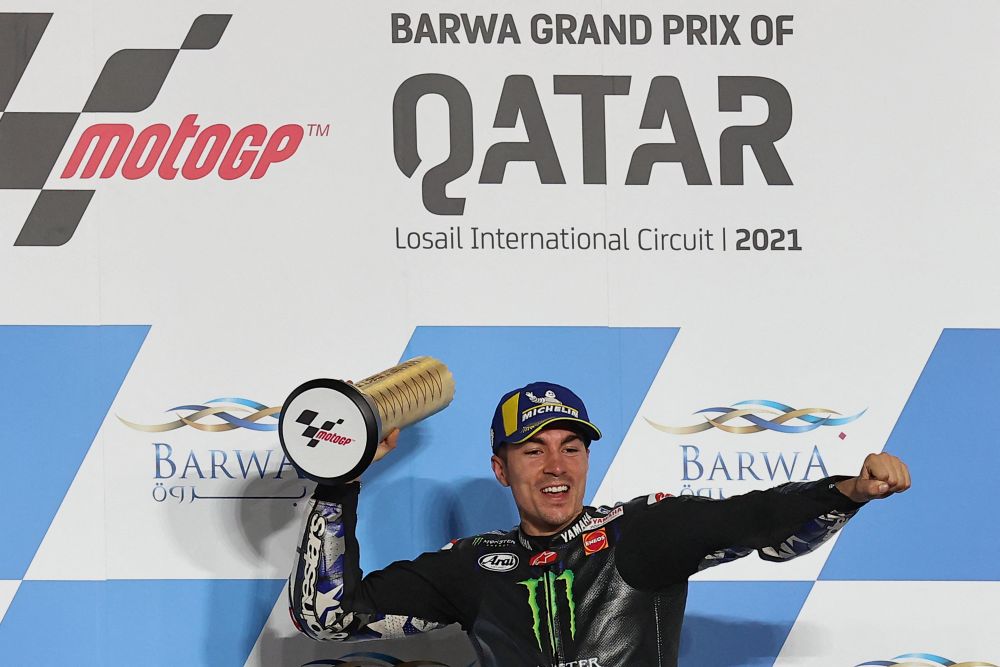Monster Energy Yamaha MotoGP's Spanish rider Maverick Vinales celebrates after winning the Moto GP Qatar Grand Prix at the Losail International Circuit, in the city of Lusail on March 28, 2021. u00e2u20acu201d AFP pic