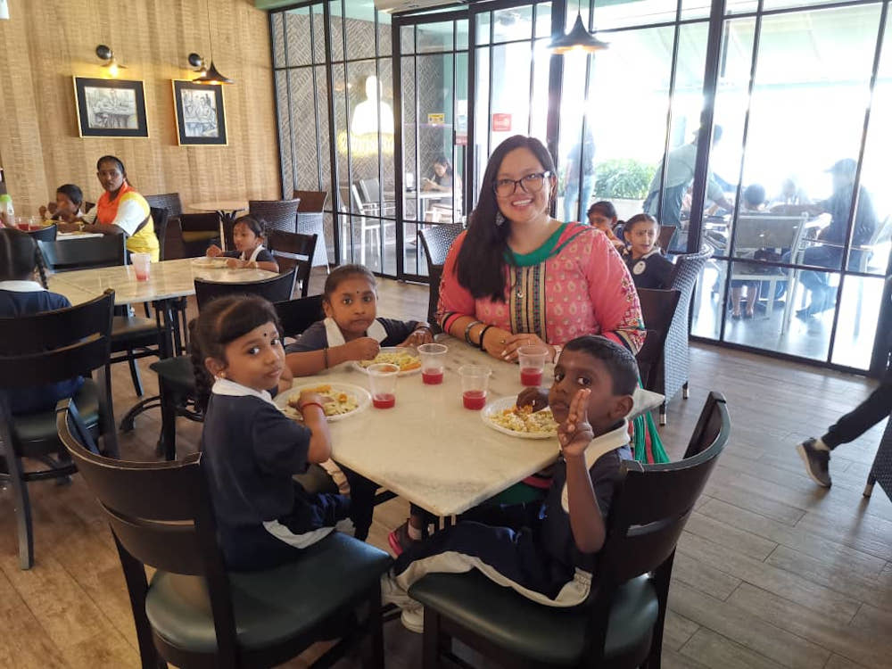 Melissa bringing out children of plantation workers for a Deepavali brunch treat in 2019. u00e2u20acu201d Picture courtesy of Melissa Mohan Tyndall