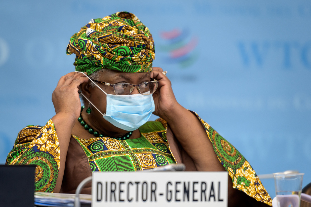 New WTO director-general Ngozi Okonjo-Iweala adjustes her face mask as a preventive measure against the Covid-19 coronavirus during a session of the WTO General Council upon her arrival at the WTO headquarters to takes office March 1, 2021 in Geneva. u00e2u20acu201d 