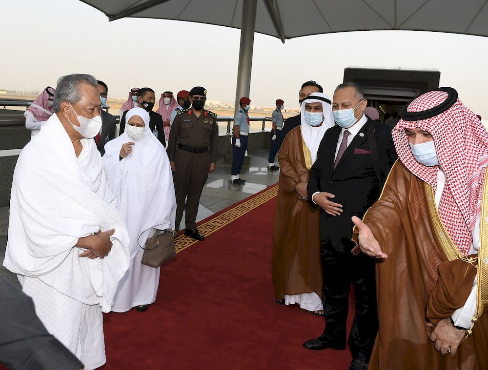 Prime Minister Tan Sri Muhyiddin Yassin and his wife Puan Sri Noorainee Abdul Rahman during arrival at King Abdulaziz International Airport, Jeddah, March 6, 2021. u00e2u20acu201d Bernama pic