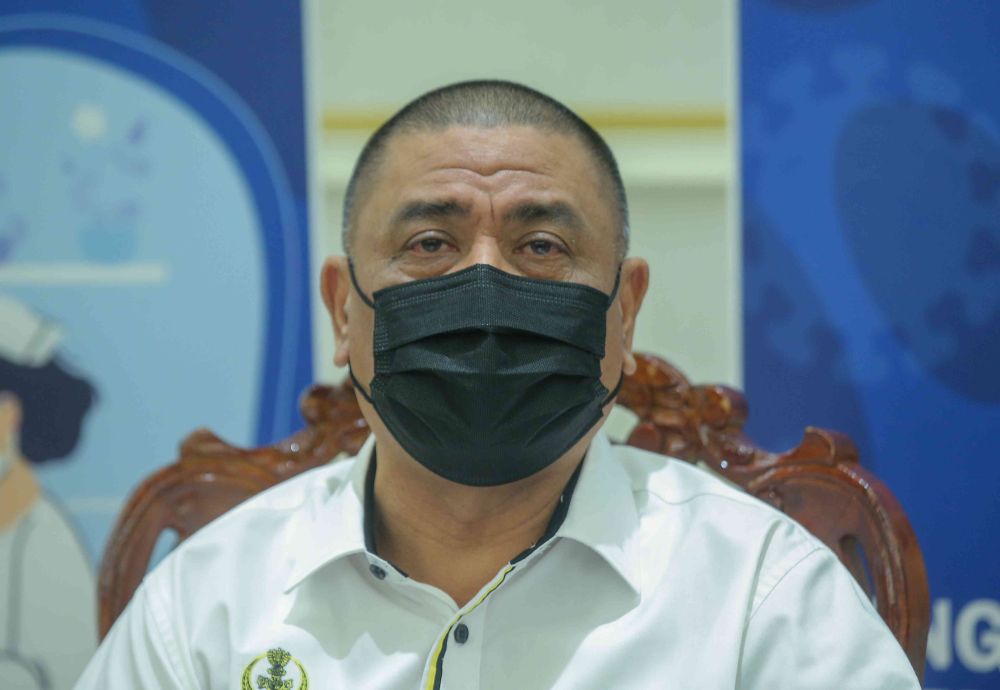 Perak Mentri Besar Datuk Saarani Mohamad speaks to the press after receiving his Covid-19 jab at the Indera Mulia Stadium in Ipoh March 1, 2021. u00e2u20acu201d Picture by Farhan Najib
