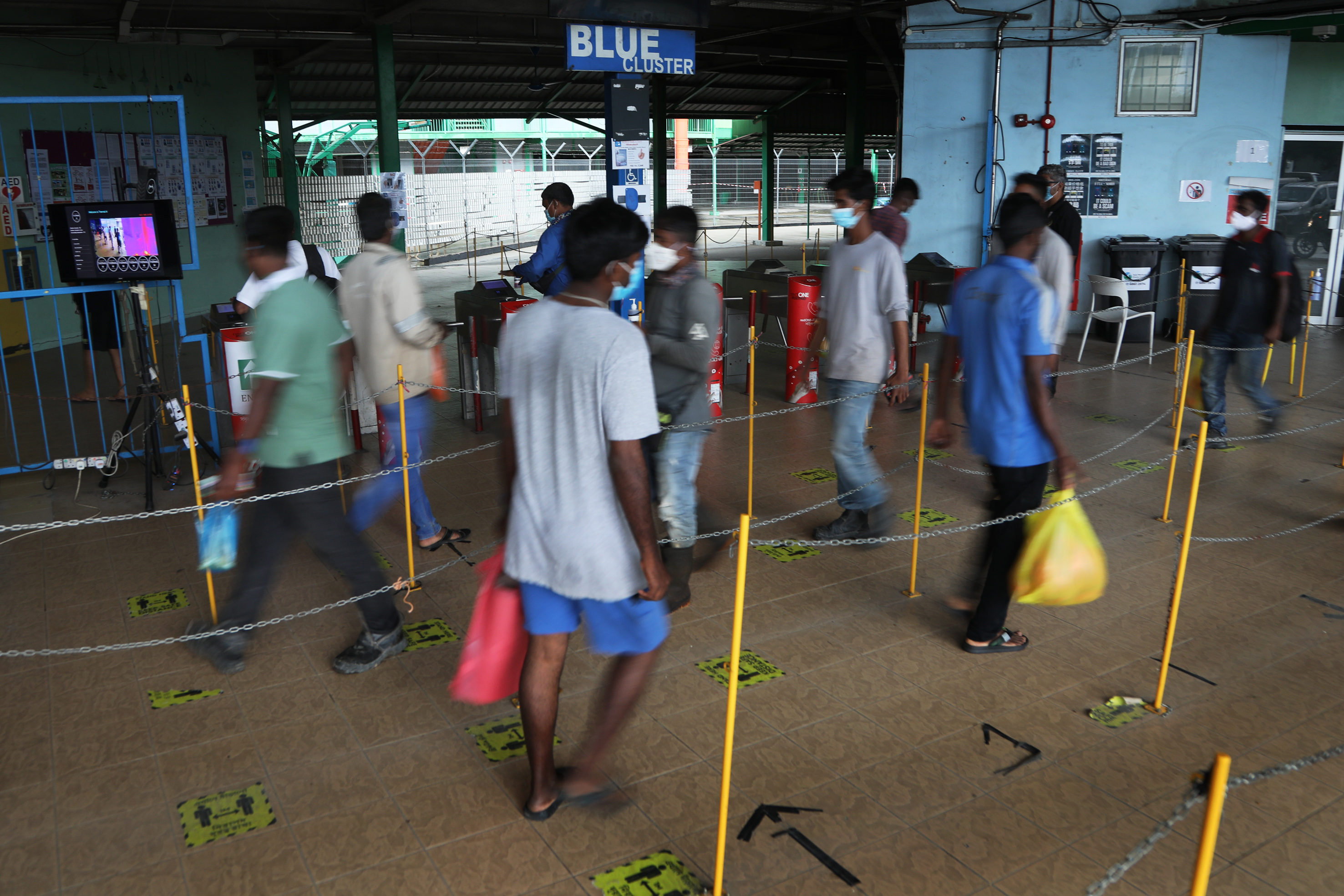 In total, nearly half of the over 320,000 foreign workers living in dormitories have tested positive for Covid-19 in polymerase chain reaction (PCR) or serology tests. — Photo by Raj Nadarajan for TODAY