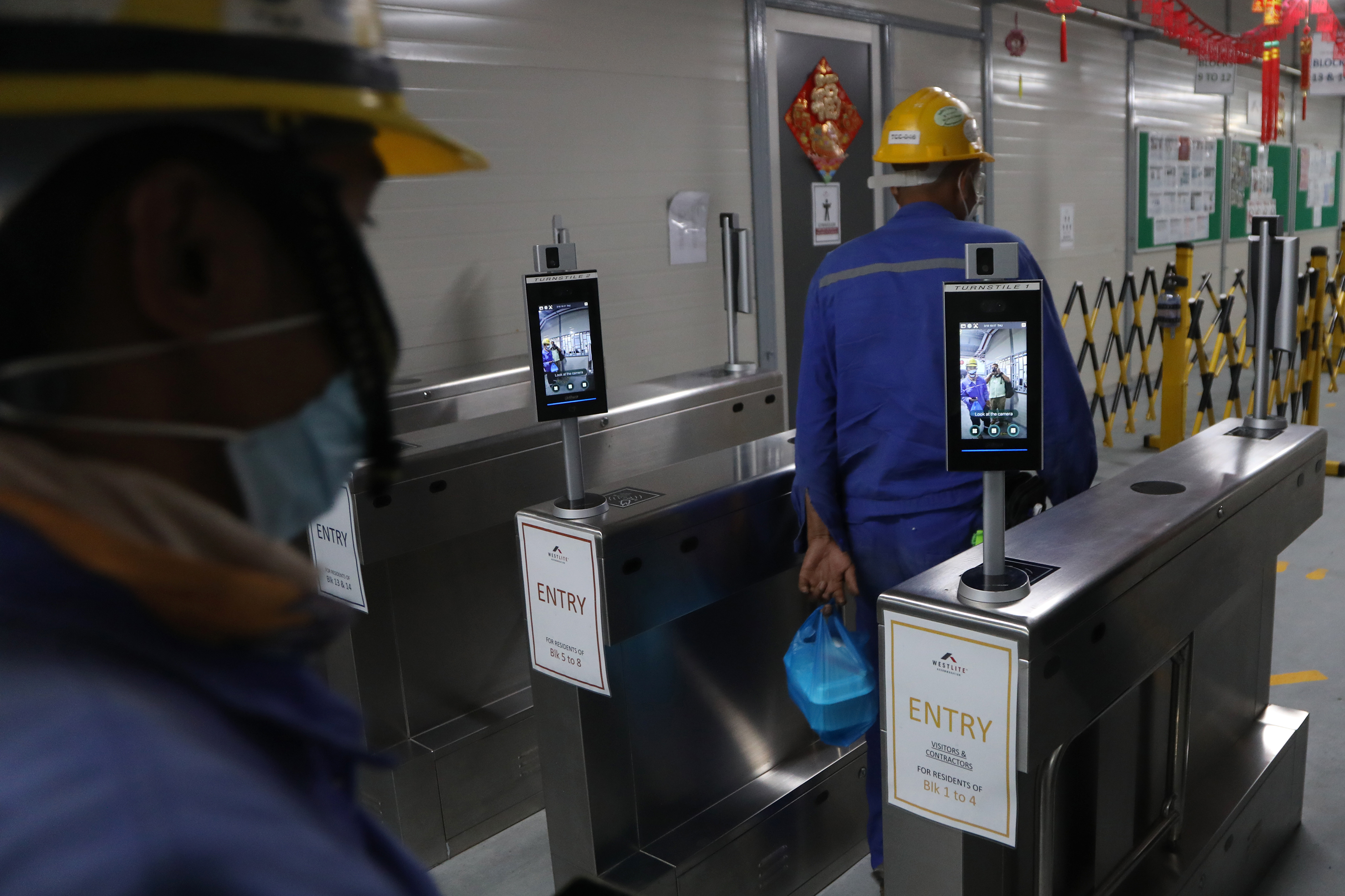 Facial recognition technology is used at the entrance of a Quick Build Dormitory managed by Westlite Accommodation at Tuas Avenue 2. — Photo by Raj Nadarajan for TODAY