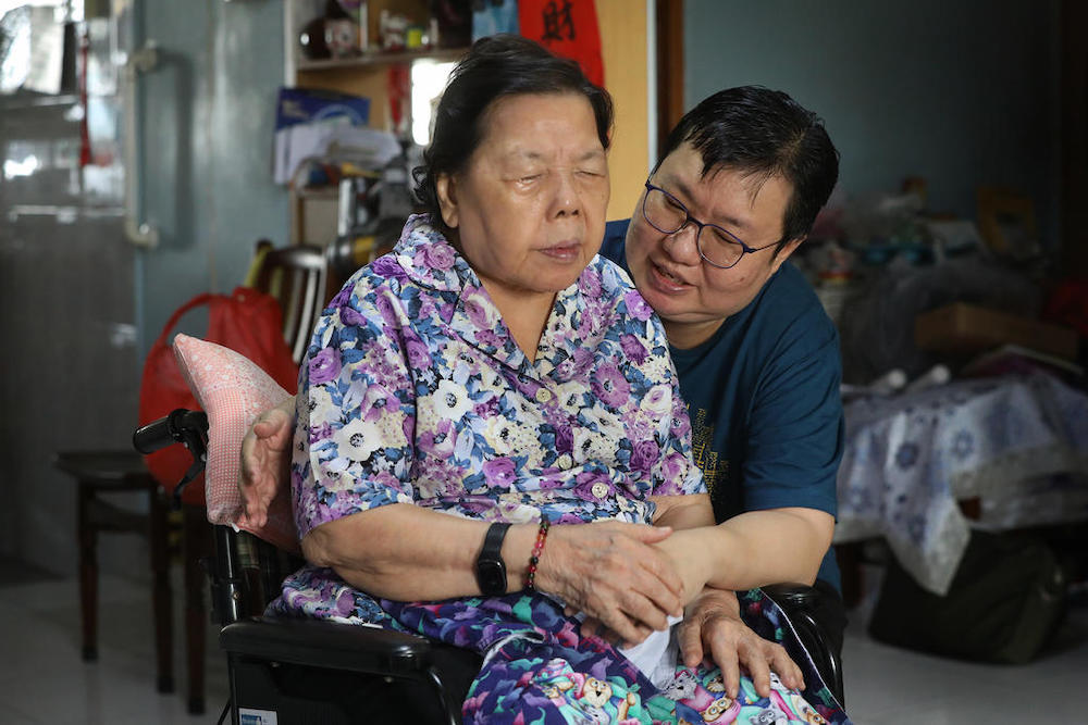 Ms Jasmine Chua caring for her 84-year-old mother who has dementia. u00e2u20acu201d Photo by Raj Nadarajan for TODAYnn