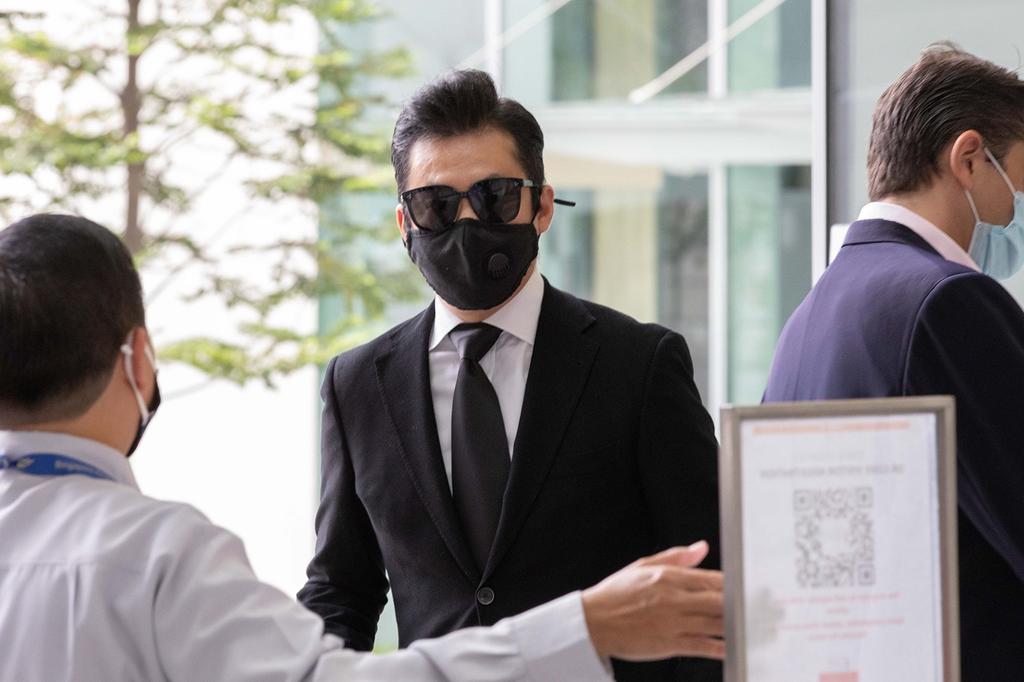 Mediacorp actor Terence Cao arriving at State Courts on March 2, 2021. u00e2u20acu2022 TODAY pic