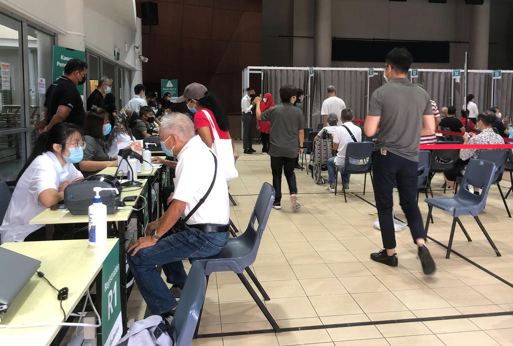 The scene at a vaccination centre in Marine Parade Community Club in February 2021. u00e2u20acu2022 TODAY pic