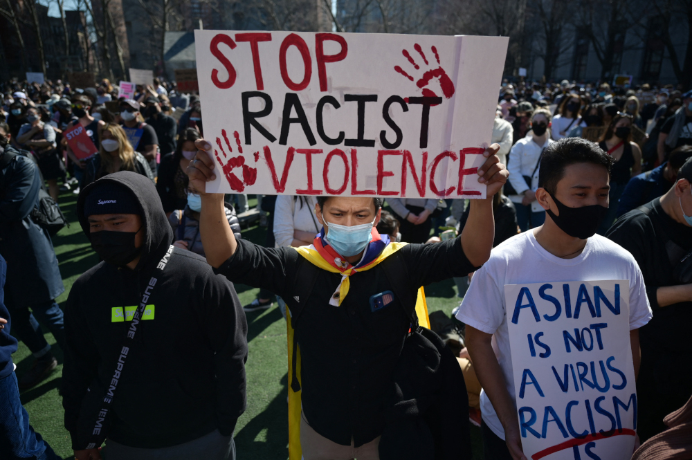 Members and supporters of the Asian-American community attend a u00e2u20acu02dcrally against hateu00e2u20acu2122 at Columbus Park in New York City March 21, 2021. u00e2u20acu201d AFP picnn