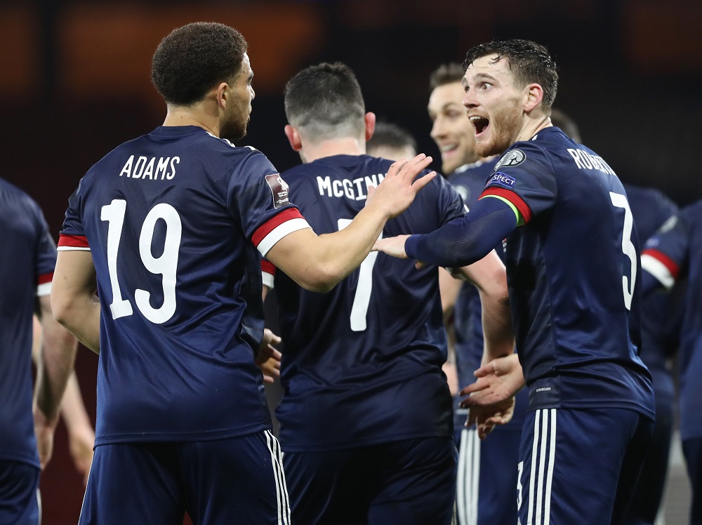 Scotland's Andrew Robertson celebrates with Che Adams after the match against Austria March 26, 2021. u00e2u20acu2022 Reuters pic