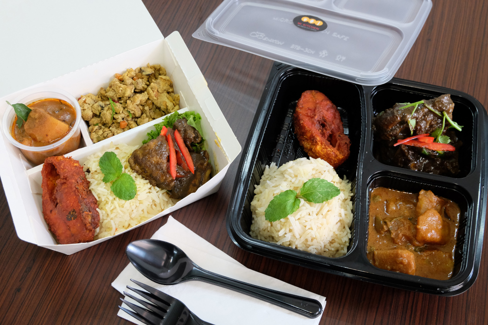 A meal comes in a box with cutlery. — Picture by Steven Ooi KE