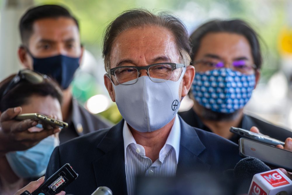 Datuk Seri Anwar Ibrahim speaks to members of the media at the MACC headquarters in Putrajaya March 22, 2021. u00e2u20acu201d Picture by Shafwan Zaidon