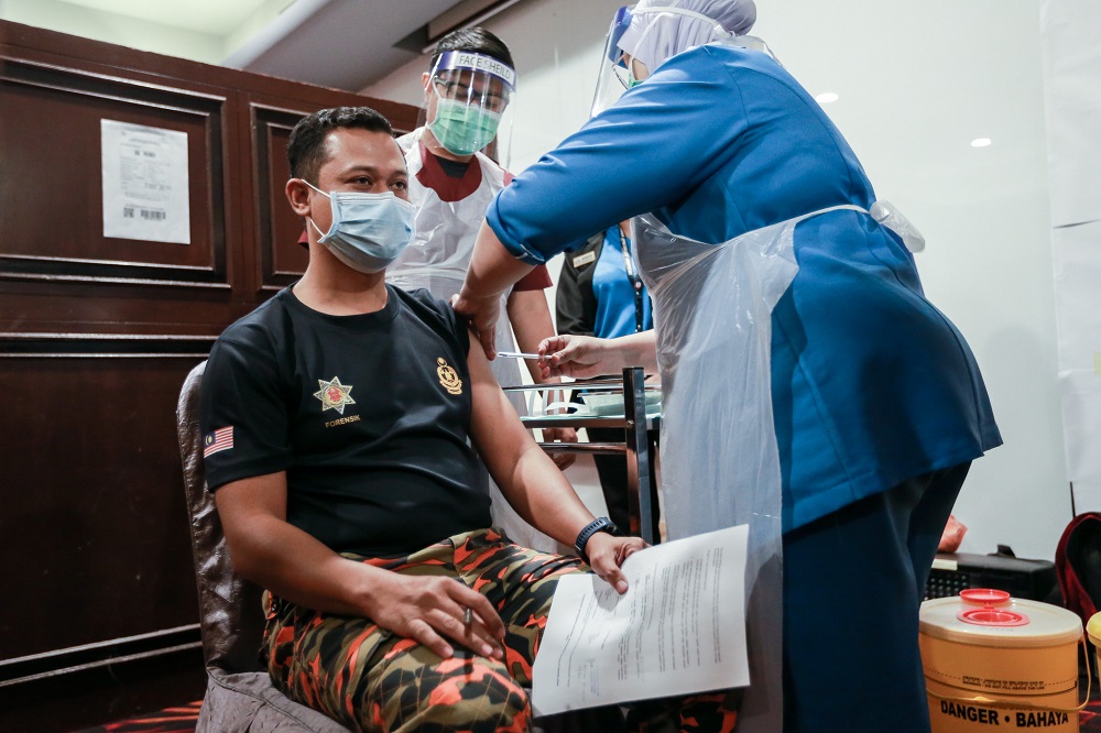 Frontliners receive the first dose of the Covid-19 Pfizer vaccine at the Sunway Pyramid Convention Centre March 11, 2021. u00e2u20acu2022 Picture by Ahmad Zamzahuri