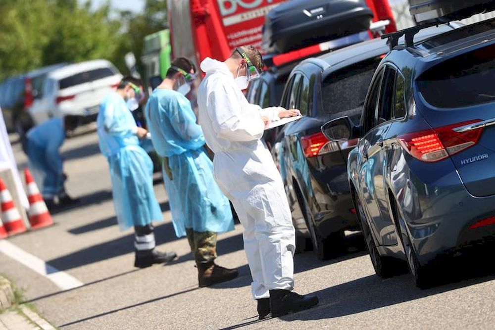 Travellers register before receiving a coronavirus disease (Covid-19) test at a corona test centre at the Markusberg service station at the A64 motorway direction Luxemburg near Trier, Germany, August 7, 2020. u00e2u20acu201d Reuters pic