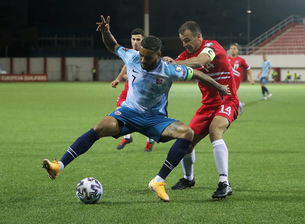 Norway's Joshua King in action with Gibraltar's Roy Chipolina March 25, 2021. u00e2u20acu2022 Reuters pic