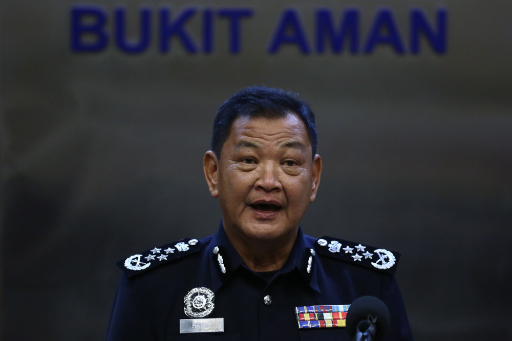 Inspector-General of Police Tan Sri Abdul Hamid Bador speaks during a press conference at the Bukit Aman headquarters in Kuala Lumpur March 25, 2021. u00e2u20acu201d Picture by Yusof Mat Isa