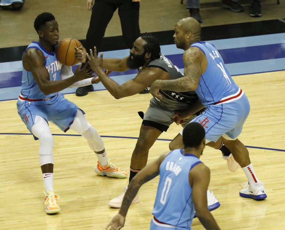 James Harden #13 of the Brooklyn Nets loses the ball as he is pressured by PJ Tucker #17 of the Houston Rockets and Victor Oladipo #7 at the Toyota Centre, Houston  March 3, 2021. u00e2u20acu201d Reuters pic