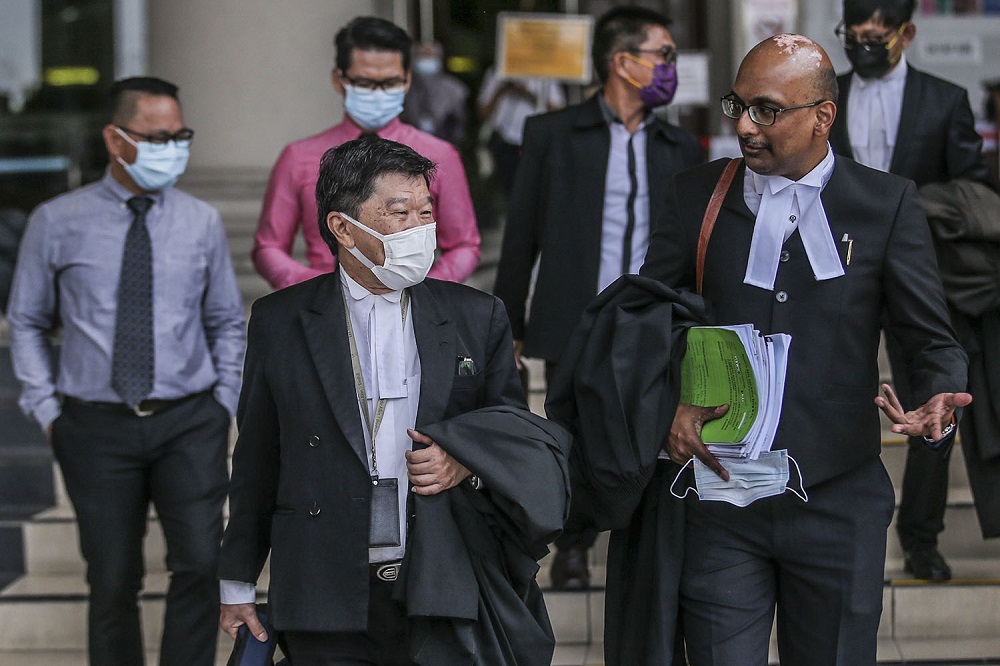 Sarawakian Christian Jill Ireland’s lawyers Annou Xavier (right) and Lim Heng Seng (left) are seen at the Kuala Lumpur High Court, March 10, 2021, after the High Court ruled as unconstitutional the Malaysian government’s directive on a total ban on the use of the word ‘Allah’ in Christian publications. ― Picture by Hari Anggara