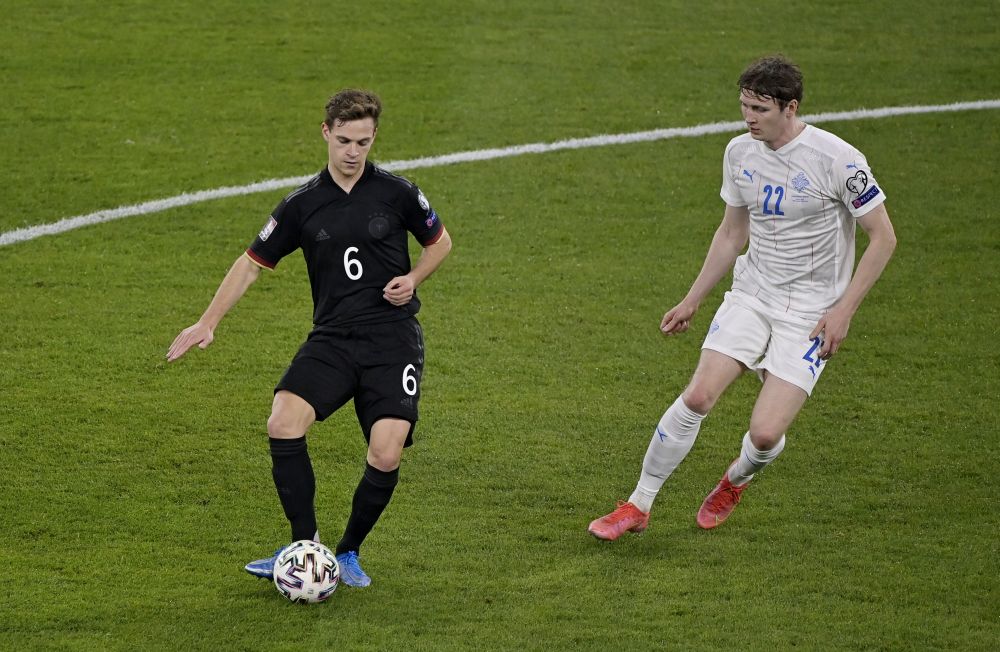 Germany's Joshua Kimmich (left) in action with Iceland's Jon Bodvarsson at the MSV-Arena, Duisburg March 25, 2021. u00e2u20acu201d Reuters pic