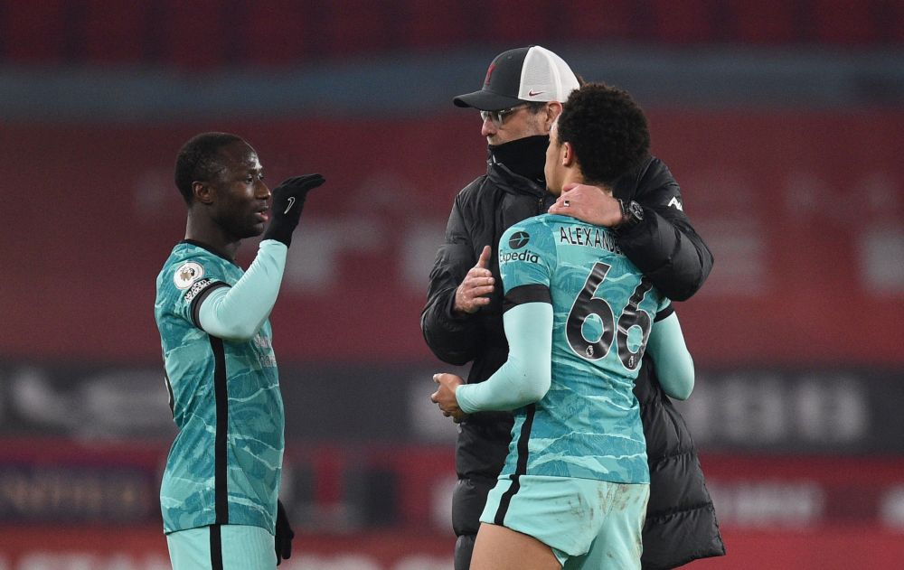 Liverpool manager Juergen Klopp celebrates with Trent Alexander-Arnold and Naby Keita after the match against Sheffield United at Bramall Lane, Sheffield February 28, 2021. u00e2u20acu201d Reuters pic