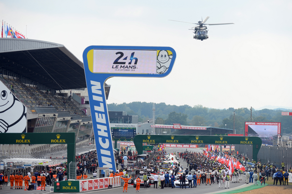 In this file photo taken September 19, 2020 Competitors wait for the start signal from military in a Caracal helicopter during the 88th edition of the Le Mans 24 Hours endurance race, at Le Mans north-western France. u00e2u20acu201d AFP picnn