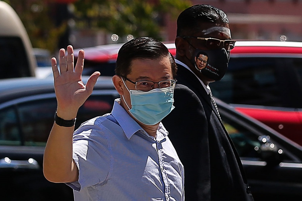 DAP secretary-general Lim Guan Eng arrives at the Northeast District Police Station in George Town March 11, 2021. u00e2u20acu201d Picture by Sayuti Zainudinnn