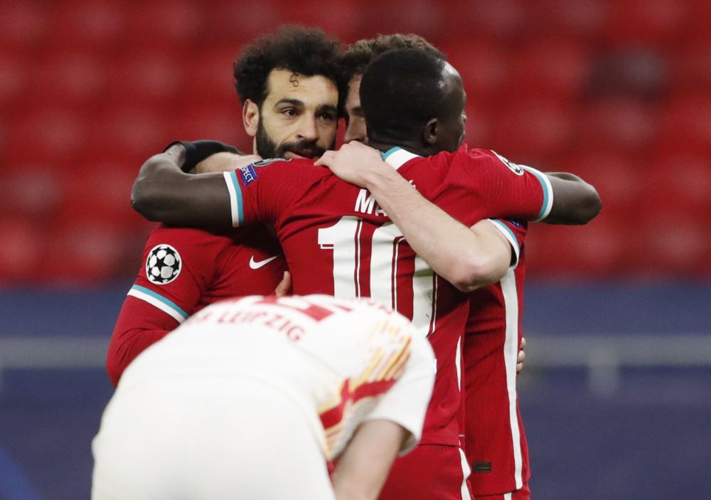 Liverpool's Mohamed Salah celebrates scoring their first goal against RB Leipzig with teammates at the Puskas Arena, Budapest March 10, 2021. u00e2u20acu201d Reuters picn