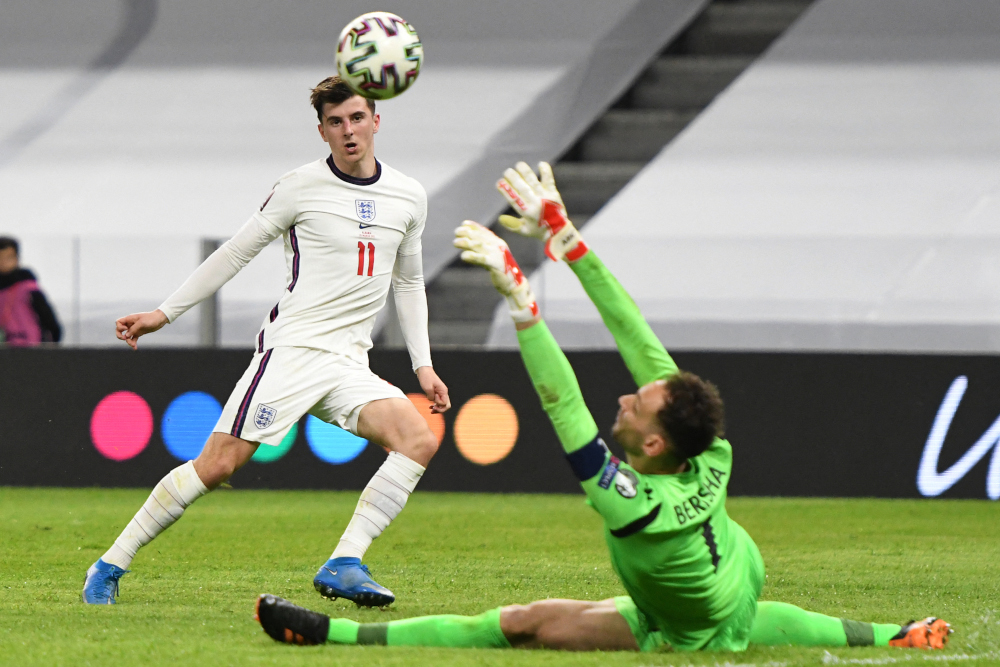 Englandu00e2u20acu2122s midfielder Mason Mount scores during the Fifa World Cup Qatar 2022 qualification Group I football match between Albania and England at the Air Albania Stadium, in Tirana March 28, 2021. u00e2u20acu201d AFP picnn